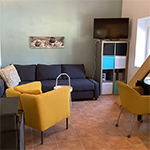 Woonkamer appartement Luna met slaapbank